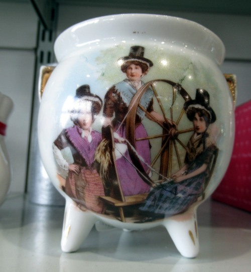 shiftythrifting:  I didn’t purchase this and I really wish I had. This is a small china cauldron with a picture of women in traditional Welsh dress printed on it. There are some (convincing) discussions and arguments that traditional Welsh clothing