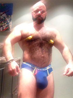 hung4hungcom:  Masculine mature daddy porn www.datedicklive.comFor men into  uncut monstercocks bull balls and huge pig nipples.  Physically my kind of man - he&rsquo;s hairy, sexy, muscular and has an awesome bulge - WOOF