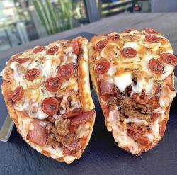 modelo-citizen:  gregwuzhere: food-porn-diary:  [I Ate] Pizza Taco  God that looks like it’s worth the resultant atherosclerosis  looks GROSS  Few things we disagree on but this is it fam, this look as delicious as it is incredibly unhealthy 