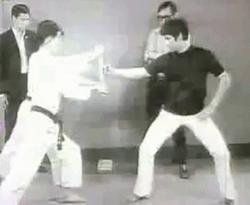 science-junkie:  The intriguing science behind Bruce Lee’s one-inch punch It’s a punch that has captivated our imagination for decades. From the distance of one-inch, Bruce Lee could break boards, knock opponents off their feet and look totally badass