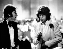soundsof71:  John Lennon and Mick Jagger, Los Angeles 1974, at the American Film Institute tribute to James Cagney, by Ron Galella, via Paddle8 