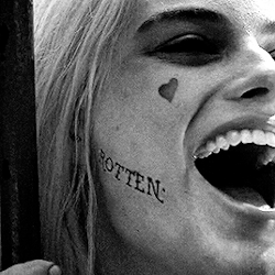 henriscavill:  the abc of harley quinn: t→ tattoos“She did these herself in prison,” Robbie says about Harley Quinn’s various Joker-themed tattoos in the on-set interview with Yahoo! Movies UK. “They’re stick and poke tattoos, prison-style