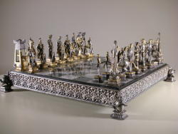 playroom:  Vintage Giuseppe Vasari (1934 - 2005) Metal Figural Chess Set. Complete. One pawn piece is a new replacement by Mr. Gianni Inclimona Vasari, 2013. Circa: 1970s, Italy. Romans vs Egyptians Series, numbered 12. 