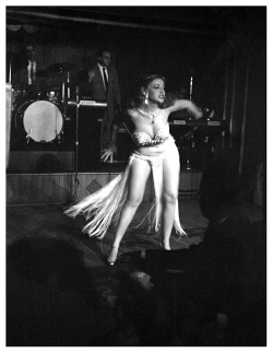 Rusty Lane dances on stage at an unidentified 50’s-era showbar..