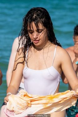 arthurred:  Camilla Cabello in wet see through swimsuit at the beach in Miami