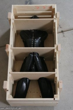 kinkykara:  Inside he added eyelets so I can secure his ankles and wrists when he is standing up and when he is sitting down inside the bondage box.  The wardrobe comes with a sturdy lock on the door, but I had him add a big padlock too, just so he knows