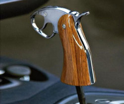 awesomeshityoucanbuy:  Gun Shift Knob Turn regular traffic violation stops into full on arrests with the realistic gun shift knob in your vehicle. This revolver-styled knob includes step by step instructions for installation and is designed to work on