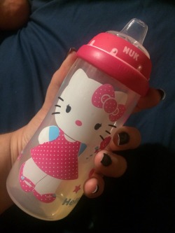 Drinking strawberry juice out of my Hello Kitty bottle!