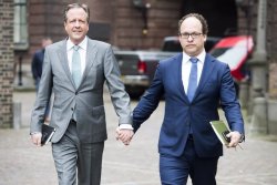 gaywrites:  Here is something: After two men in the Netherlands were attacked while walking home from a party holding hands, straight Dutch politicians everywhere are showing their solidarity by walking around holding hands. The top photo is of Dutch