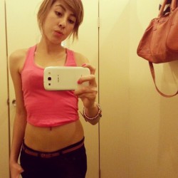 crashfalls:  I have this muscle shirt/crop top addiction, got it in white too lol. #fittingroom #shoppingearlier