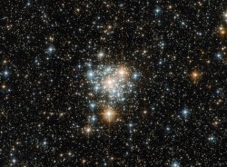 just&ndash;space: Hubble Takes Flight with the Toucan and the Cluster : NGC 299 is an open star cluster located within the Small Magellanic Cloud just under 200,000 light-years away.  js 