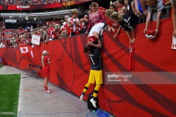 galpalsworldcup:  ellamasarms:  ap00:  whogivesaflip11:  I love how the caption is actually:“Goalkeeper Erin McLeod celebrates with a fan at the end of the FIFA Women’s World Cup 2015 Round of 16 match between Canada and Switzerland at BC Place Stadium