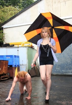 female-supremacist:I like that it’s raining but she doesn’t give any consideration to his comfort. That’s female power!