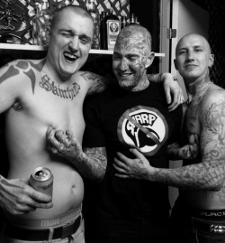 daytonbaldy:  The lad in the center is doing a fine job of training these two! First the shearing, then the inking, and now the titPlay! Nothing like a gay skinhead indoctrinating new recruits! 