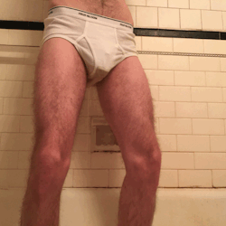 chastitysuitandtie:You can see the cage right through my piss soaked tighty-whities.