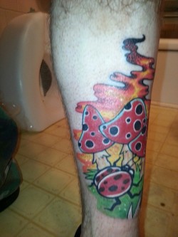My new tattoo I got tonight..  always wanted some mushrooms and the ladybug is for my mom.