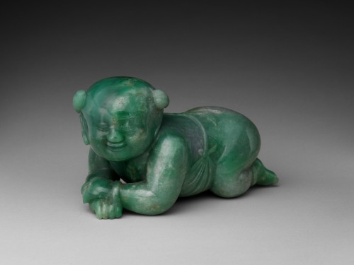 blondebrainpower:Jade pillow in the shape of an infant boy. China, Qing dynasty, 18th to 19th century