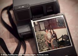sixpenceee:  A 13-year-old boy made an eerie discovery when he bought a camera at a garage sale and found a photograph of his dead uncle inside.Addison Logan found the old Polaroid camera on sale as he went around garage sales with his grandmother, Lois,
