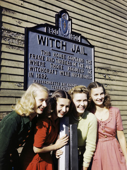 vintagegal:  Girls pose by a jail that recalls the witch trials of 1692 in Salem, Massachusetts. Photo taken in 1945. 