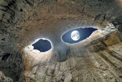 ognimod-is-back:  meditationtemptation:  &ldquo;The Eyes of God&rdquo; -Prohodna Cave, Bulgaria (Source, I believe) This is the full moon from inside a cave. It looks like two eyes staring down at you; beautiful.   that’s scary but I really wanna go