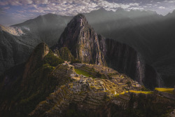earth-land: Historic Sanctuary of Machu Picchu  Machu Picchu stands 2,430 m above sea-level, in the middle of a tropical  mountain forest, in an extraordinarily beautiful setting. It was  probably the most amazing urban creation of the Inca Empire at