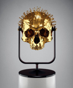 xandt:  The Longer You Last, 2013 gold-plated cast of an 18th century skull with inserted nails, custom-made black-red perspex fixture. (variations available) more on Hedi Xandt 