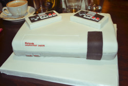 xtremecaffeine:  zellas:  NES wedding cakeCause why the fuck not eh?We decided to have personalised controllers on top rather than a bride and groom too :P  Yeah also we had this AWESOME cake which was super-sweet. IT’S CHOCOLATE CAKE!