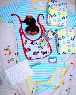 littlepeachybutt:  Did you wonder what was in my first @crinklecrate that I opened yesterday?!  It came with an adorable striped Crinkle Crate Onesie, a @onesiesdownunder Trucks Bib, two Rearz Spoiled Diapers, a Nuk 6 Green &amp; White Adult Pacifier,