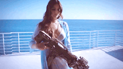 the-king-of-coney-island:  ipodmini:  High By The Beach   lana looks so hardcore with that weapon