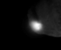 pappubahry:  The comet Tempel 1, photographed by Deep Impact, just after its 370kg impactor had (deliberately) crashed into the comet, 4 July 2005.  There’s about 1 second between frames in the gif. The impact speed was about 10.2 km/s, so the kinetic
