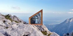 prettyarchitecture:  Alpine Shelter Skuta The extreme climatic conditions in the mountains introduce a design challenge for architects, engineers and designers. Within a context of extreme risk to environ­mental forces, it is important to design buildings