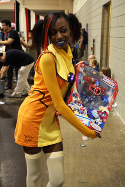 gummachine:  cosplayingwhileblack:  Character: Sari Sumdac Series: Transformers: Animated. SUBMISSION Submitter’s comments: The dress is signed by the man who did the character designs for the show.  Oh my god CUTIE!