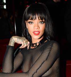 celebpaparazzi:  Rihanna wearing a see-thru top, at Balmain fashion show after party in Paris - February 27, 2014