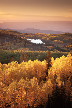 mystic-revelations:  &lsquo;Fall Layers&rsquo;, United States, Colorado, Grande Mesa (by WanderingtheWorld (www.ChrisFord.com))