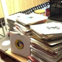 olympicvinyl:  Alphabetizing 45s getting the shop’s sections in order.
