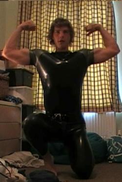 butchlvr:  danarrow:Reblog: Who wants another video of this rubber hunk? A bit young to be in to this kink…think of the potential!!