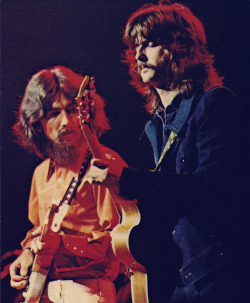 composed1:  moustache35:  brightvenus: George Harrison &amp; Eric Clapton   WOOF, WOOF,🚜🚜🚜🧔🧔💙    Mmm