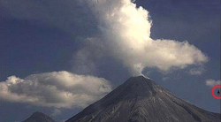 theparanormalblog:  Oddly-Shaped Object Spotted Near an Erupting Volcano in Mexico?A webcam in Colima, Mexico captured an oddly-shaped object flying past the Colima volcano as it was erupting. The mysterious craft appeared out of no where and suddenly