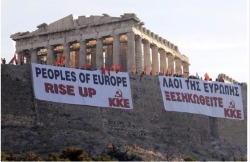 Giant banners protesting Greece’s austerity measures hang near the Parthenon on Acropolis hill in Athens early May 4, 2010. A group of demonstrators from Greece’s communist party, KKE, staged the protest atop the Acropolis as Athens braced for a 48-hour