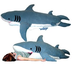 thedailywhat:   Buy This: ChumBuddy shark-themed sleeping bag by Kendra Phillips. Sure, it may not be the most practical sleeping bag in the world, but, then again, IT’S A GODDAMN SHARK NUFF SAID. [superpunch.]   I WANT TO BOUNCE AROUND PEOPLE&rsquo;S