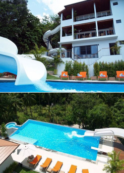 quangdnguyen:  tran-christine:  architectureblog:  lickystickypickyme:  The first home in the world with a 256-foot-long double loop water slide going from its top balcony to the pool.That’s comparable to most water slides in amusement parks. The house