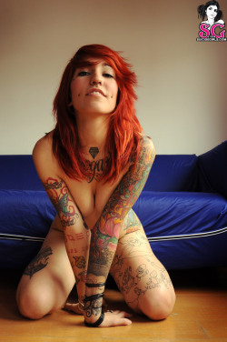 Inked and beautiful, sexy redhead.
