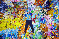 girloverboard:  Lisa Courtney’s lies amongst her collection - the Biggest Pokemon Memorabilia Collection in the world with 12,113 items, accordding to the Guinness Book of World Records. (Guinness World Records, Paul Michael Hughes) 