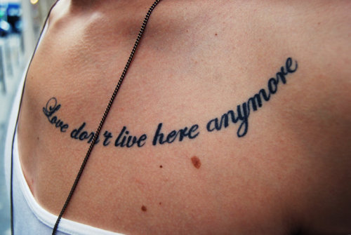 Love conquers all tattoo