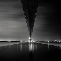 black-and-white:  Pont de Normandie at Night, France 2010 (by Arkadius Zagrabski) 