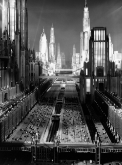 oldhollywood:  1930s imagining of 1980s New York via the sci-fi musical Just Imagine (1930, dir. David Butler) More on the building of the set here. The opening scenes of the film, which feature this cityscape, can be seen here. Buildings 250 stories