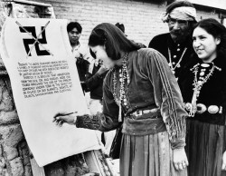 arachnomatic: aka14kgold:  vulturehooligan:     Another photo of the Navajos banning the swastika. The document they are signing starts off: “Because the above ornament, which has been a sign of friendship among our forefathers for many centuries