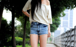 White top with Blue short.