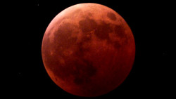 Winter Solstice &amp; a Lunar Eclipse on Tuesday, Dec. 21, at 1:33 a.m. ET(Monday 10:33pm Pacific???), according to NASA. At that time, Earth&rsquo;s shadow will appear as a dark-red mark at the edge of the moon. It will take about an hour for the mark