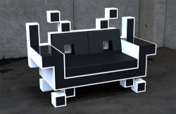 squeesuicide:  Amazing space invaders sofa, want!  That&rsquo;s freaking AWESOME!!!